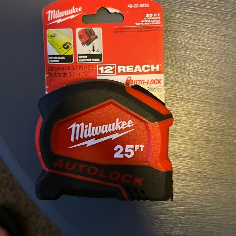 Tape measure 25 ft Milwaukee. Impact resistant with 12 ft reach.